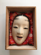 Mask of MAGOJIRO by Masahiko Matsumoto. /(with quilted textile bag and a paulownia box)