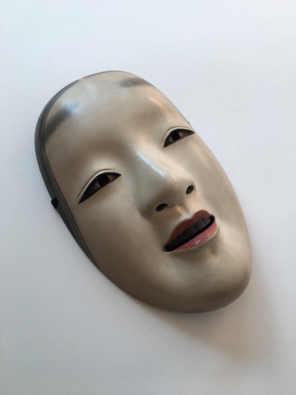 Mask of MAGOJIRO by Masahiko Matsumoto. /(with quilted textile bag and a paulownia box)