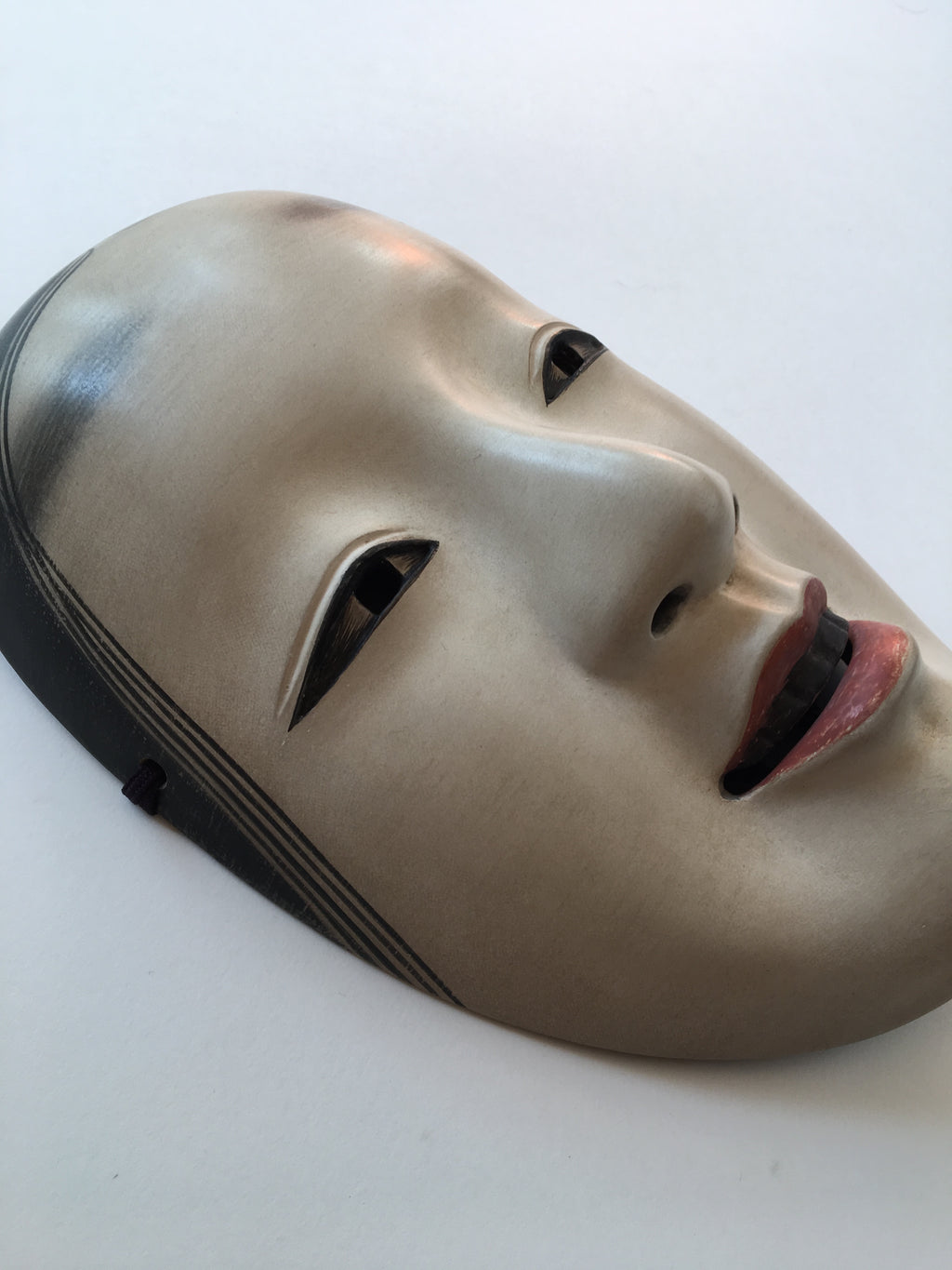 Mask of MAGOJIRO by Masahiko Matsumoto. /(with quilted textile bag and a paulownia box)