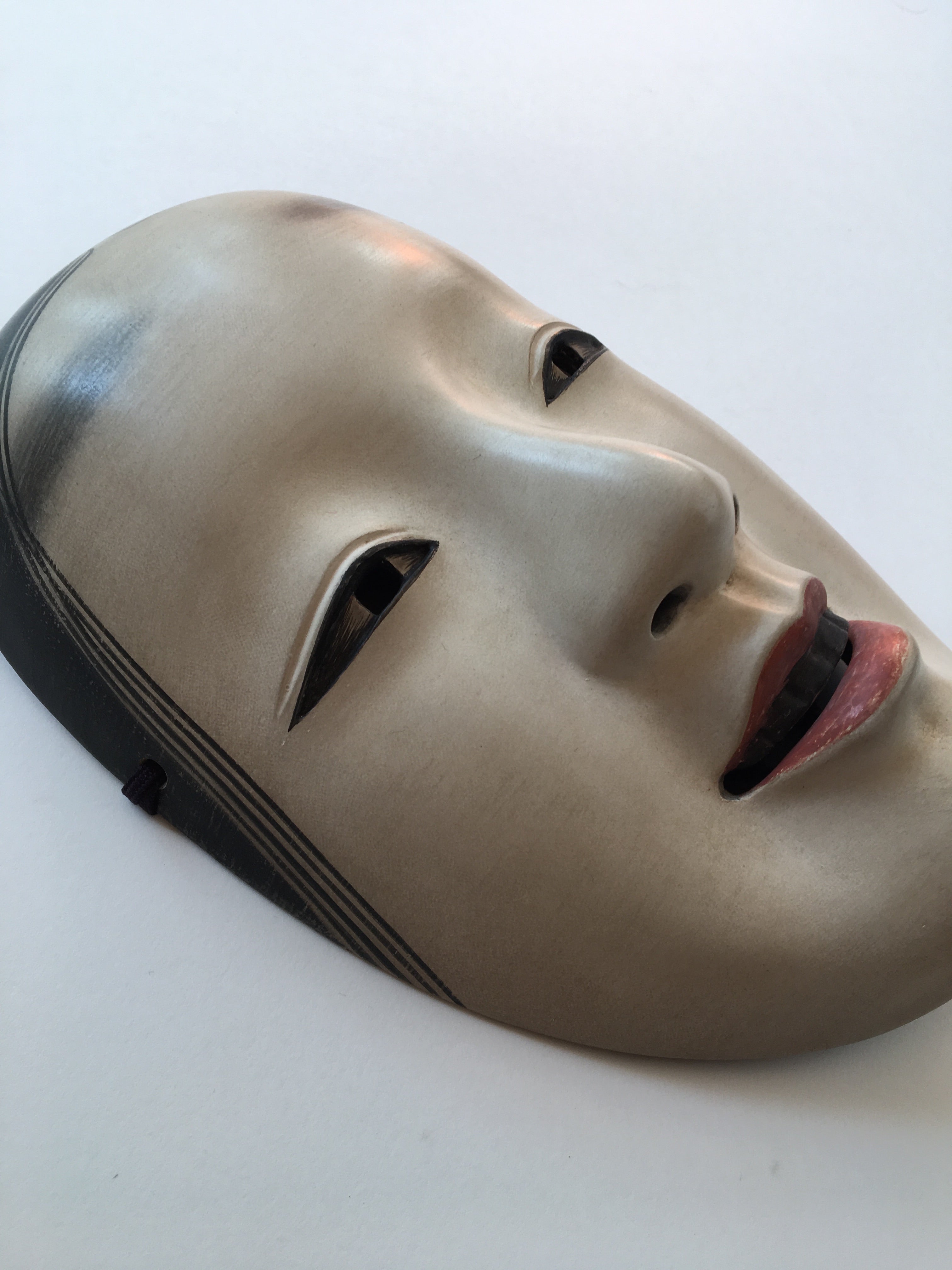 Mask of MAGOJIRO by Masahiko Matsumoto. /(with quilted textile bag and a paulownia box)