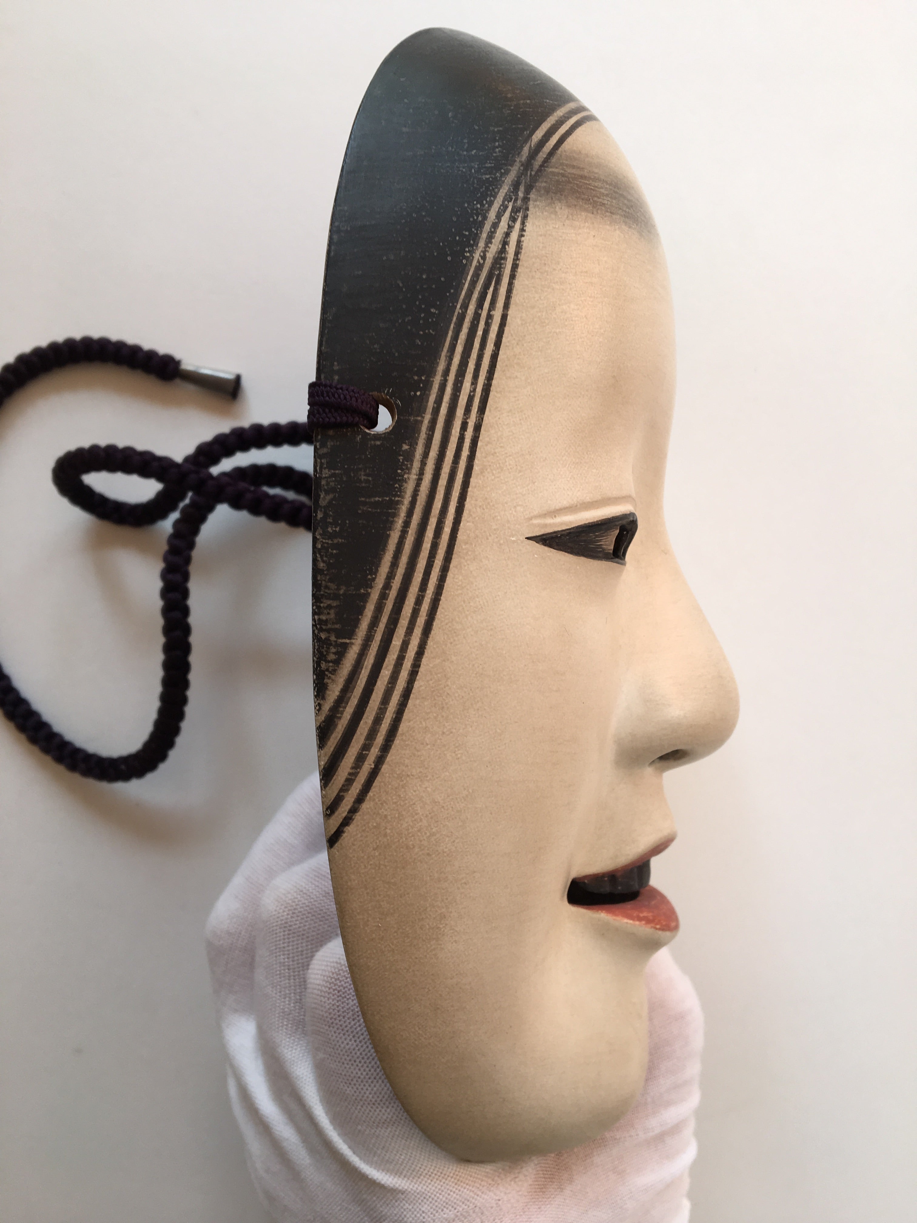 Mask of MAGOJIRO by Masahiko Matsumoto. /(with quilted textile bag and a paulownia box)