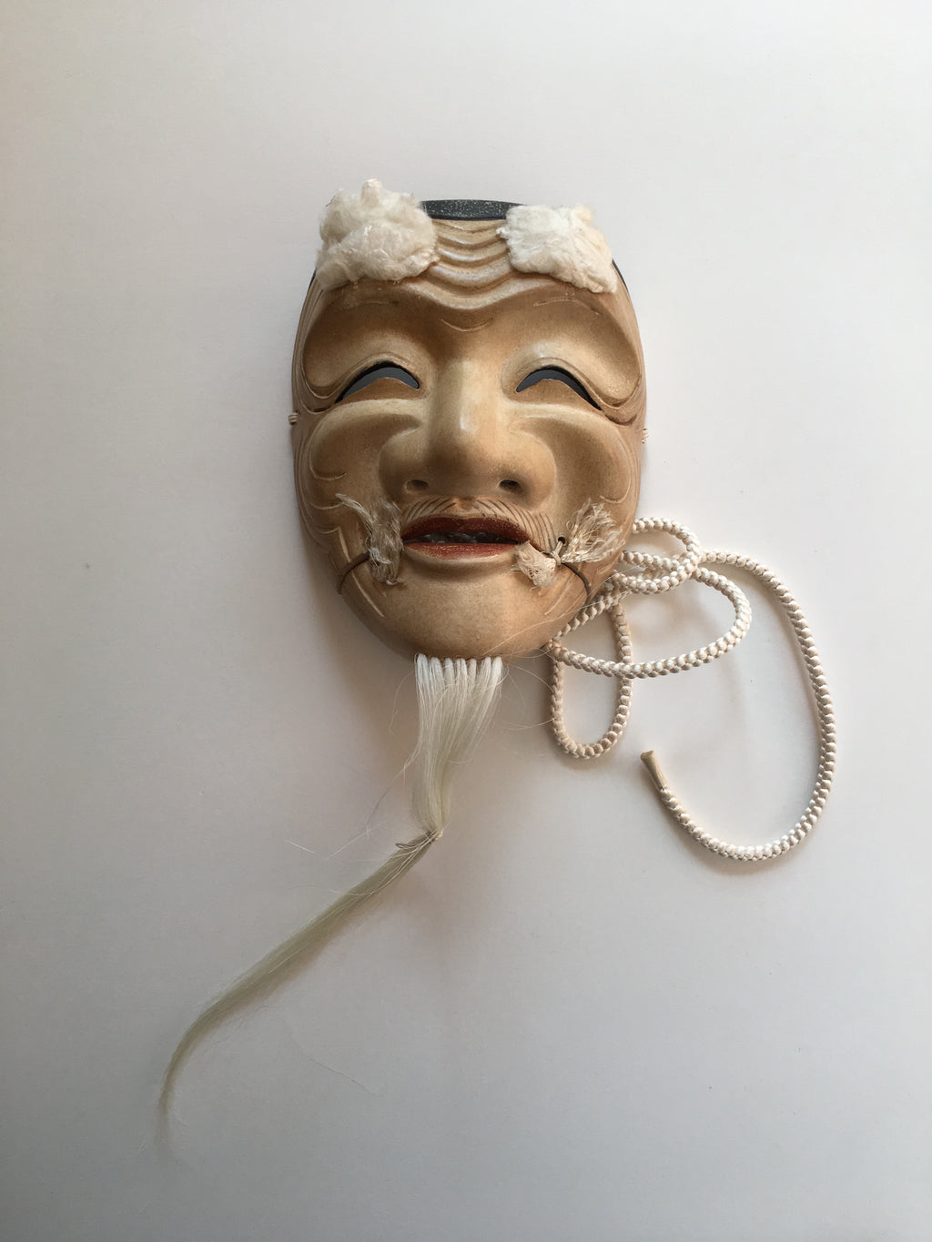 Mask of OKINA by Masahiko Matsumoto. /(with quilted textile bag and a paulownia box)