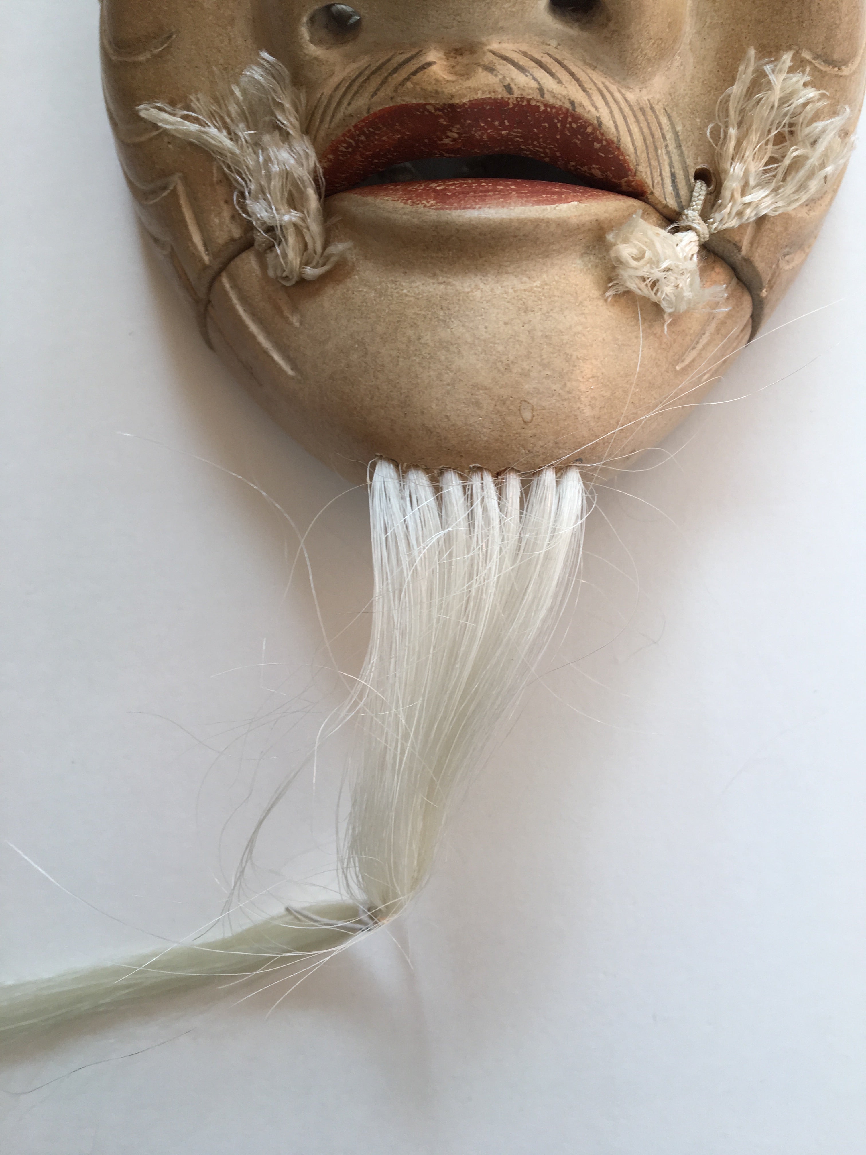 Mask of OKINA by Masahiko Matsumoto. /(with quilted textile bag and a paulownia box)