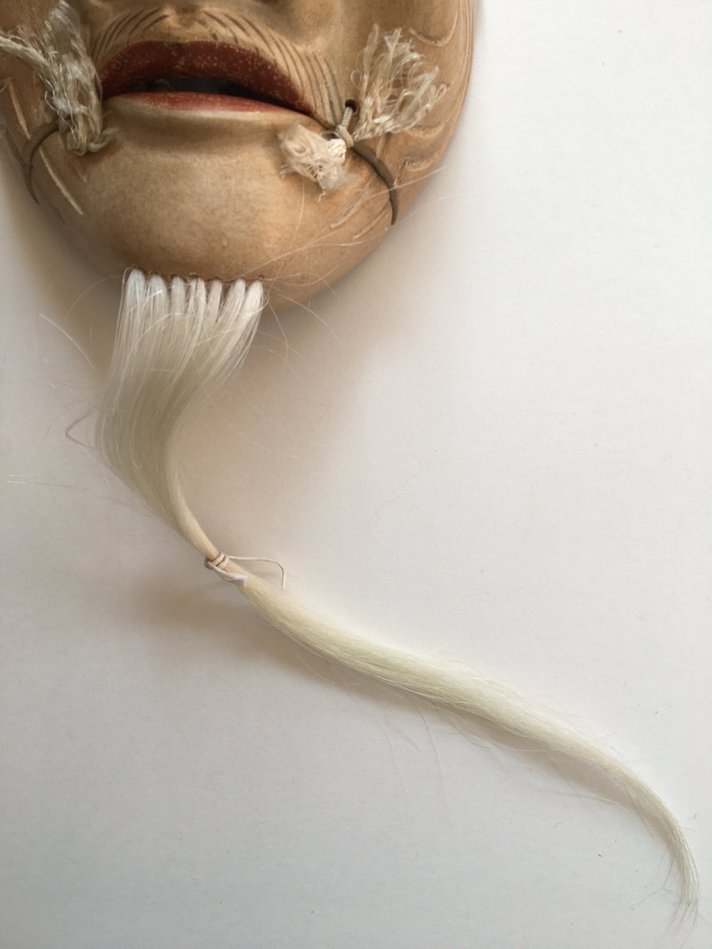 Mask of OKINA by Masahiko Matsumoto. /(with quilted textile bag and a paulownia box)